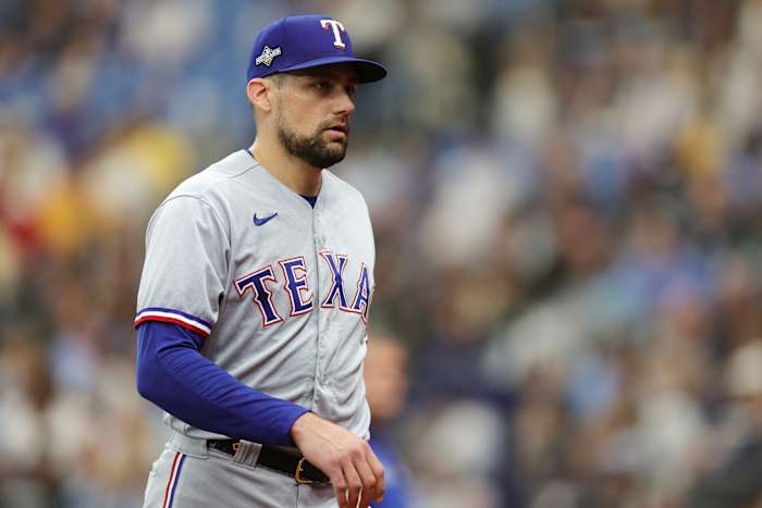 Oct 4, 2023; St. Petersburg, Florida, USA; Texas Rangers starting pitcher Nathan Eovaldi (17) leaves the mound at the end of the first inning against the Tampa Bay Rays during game two of the Wildcard series for the 2023 MLB playoffs at Tropicana Field. Mandatory Credit: Nathan Ray Seebeck-USA TODAY Sports